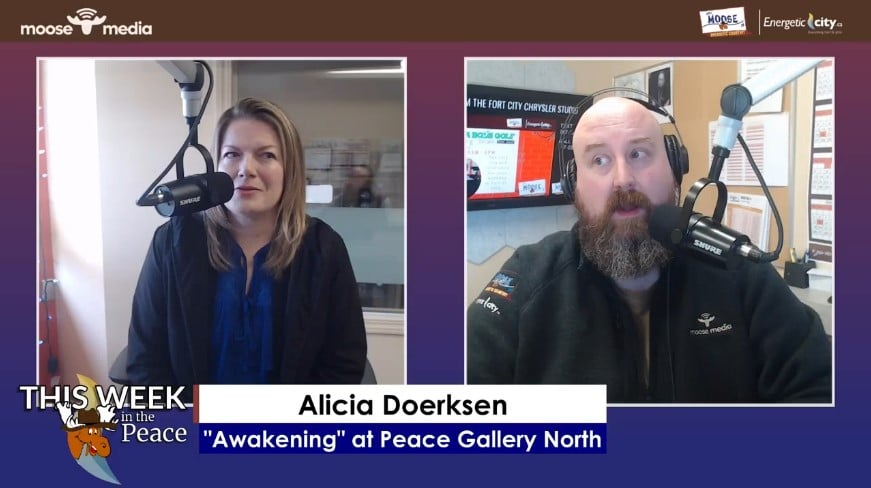 Two people recording a podcast