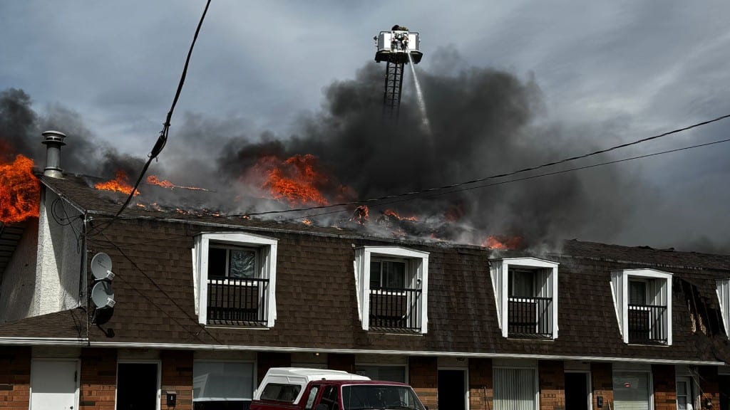 Firefighters tackling the blaze on 103rd Avenue (Ed Hitchins/Energeticcity.ca)