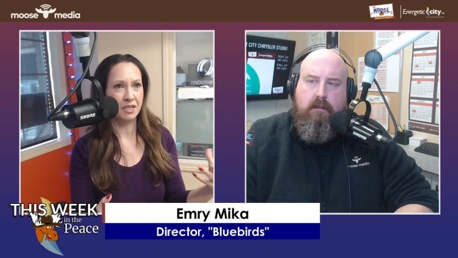 Two people recording a podcast