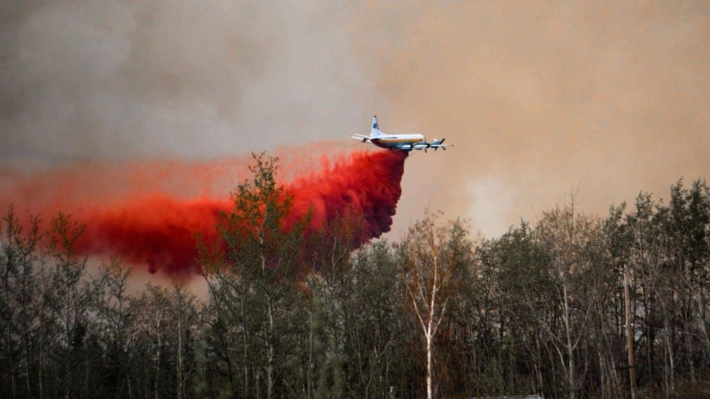 Fire retardent being dropped onto the Fish Creek Community Forest wildfire. (Darren Hart)