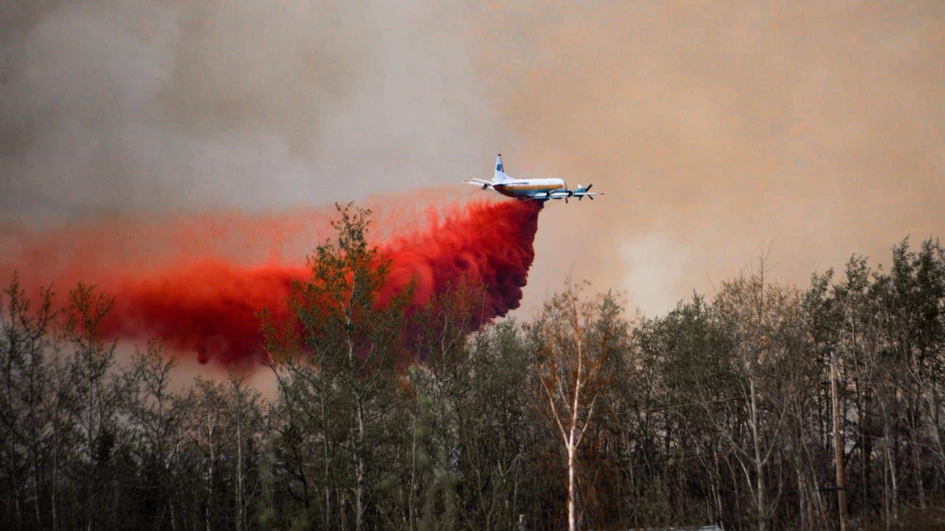 Fire retardent being dropped onto the Fish Creek Community Forest wildfire. (Darren Hart)