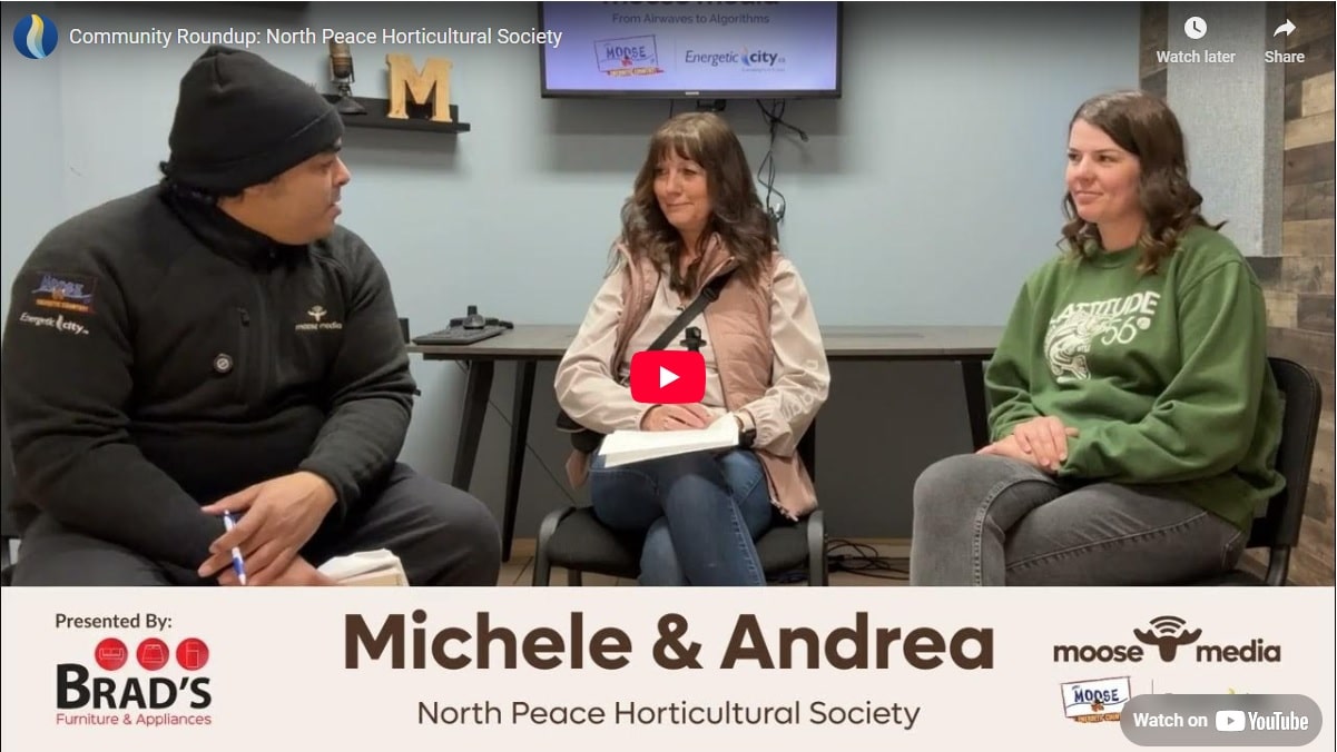 Three people smiling at the camera