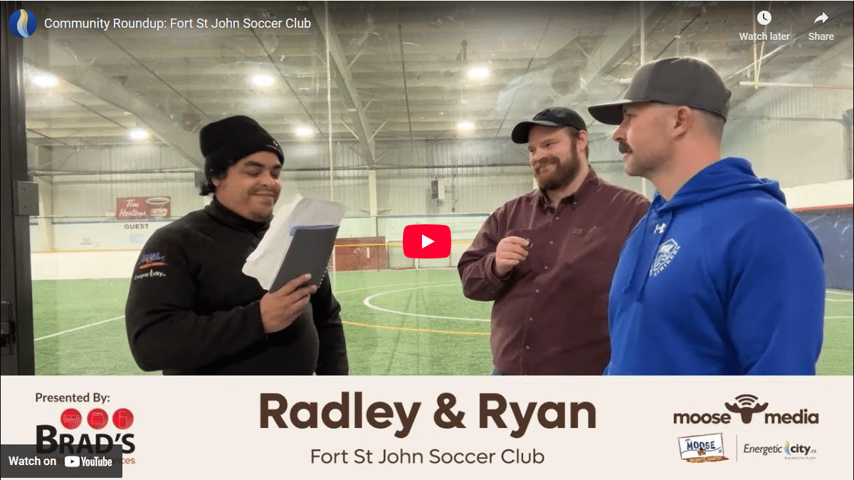 Three people smiling at the camera