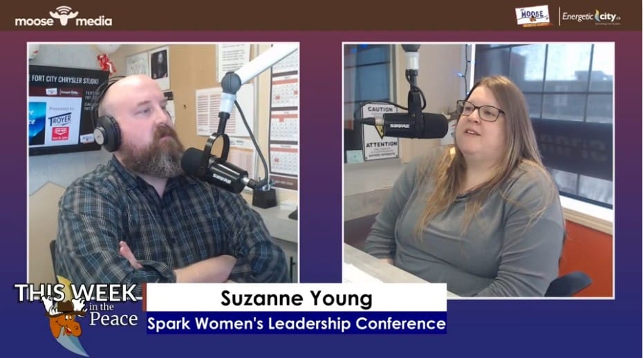 Two people recording a podcast