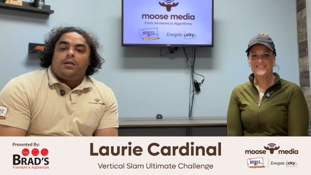 Two people smiling at the camera