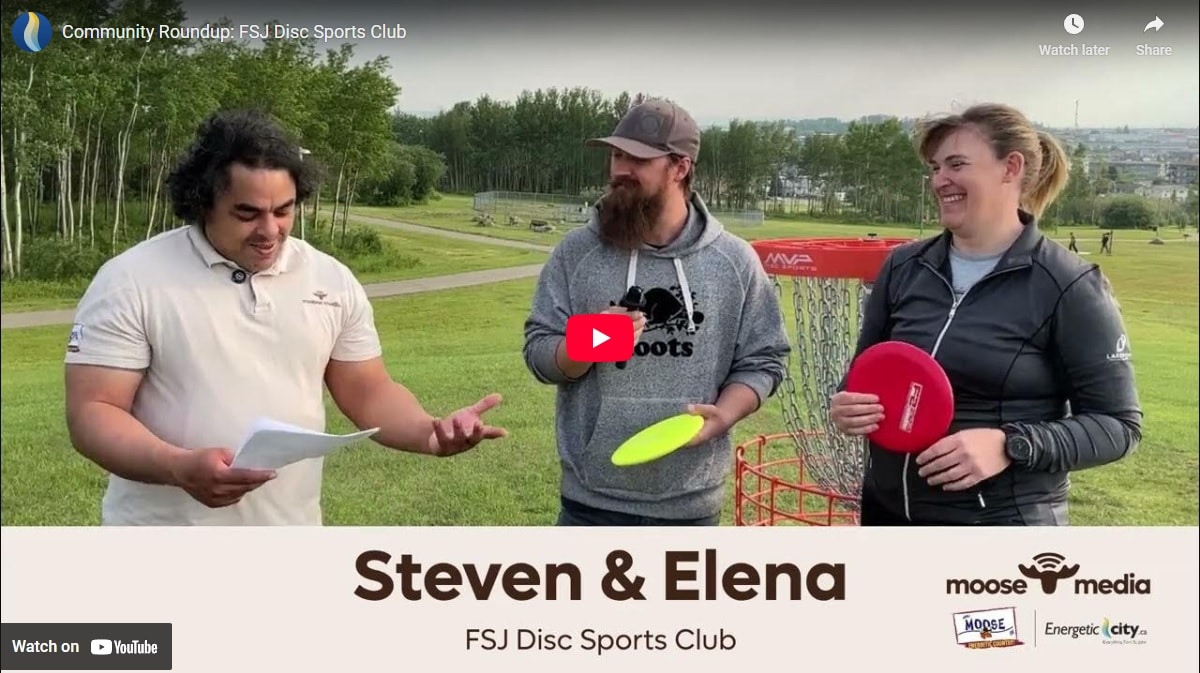 Three people smiling at the camera