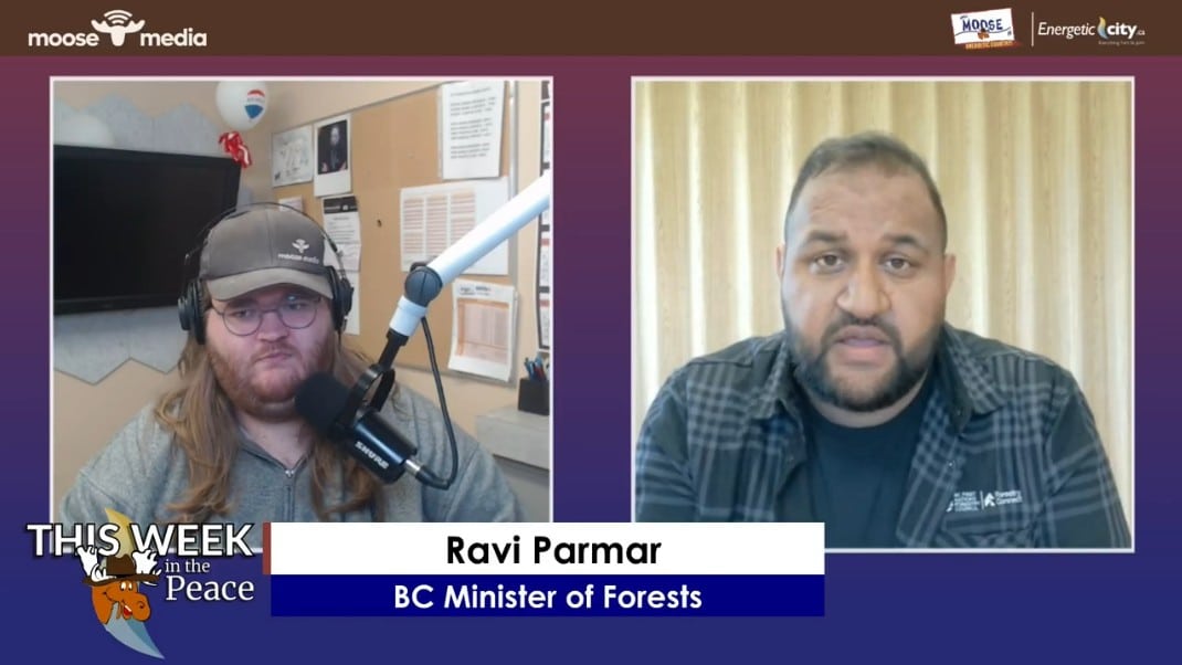 Two people recording a podcast