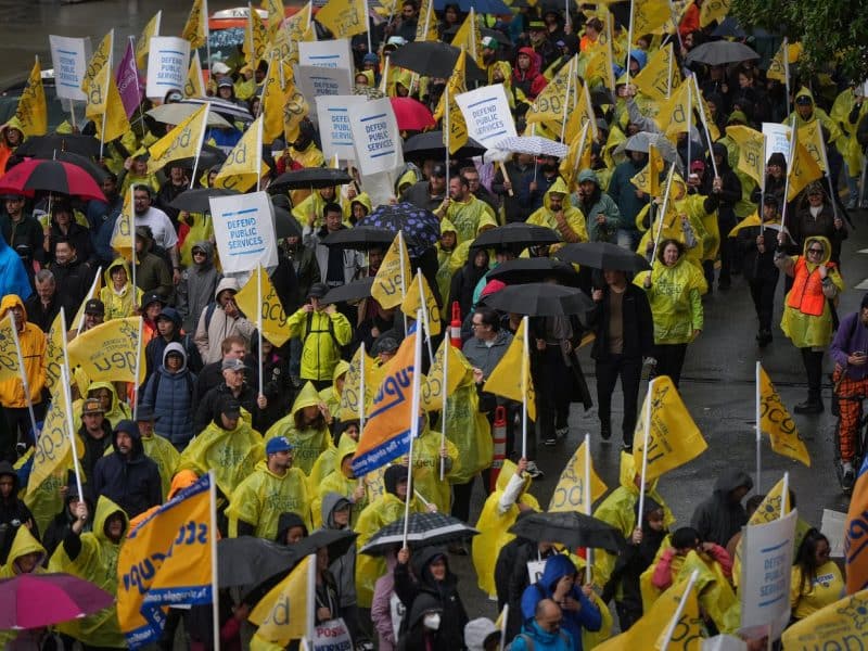 BC General Employees' Union (BCGEU) members and supporters march to a rally in Vancouver, on Wednesday, October 1st, 2025. (THE CANADIAN PRESS/Darryl Dyck DARRYL DYCK)