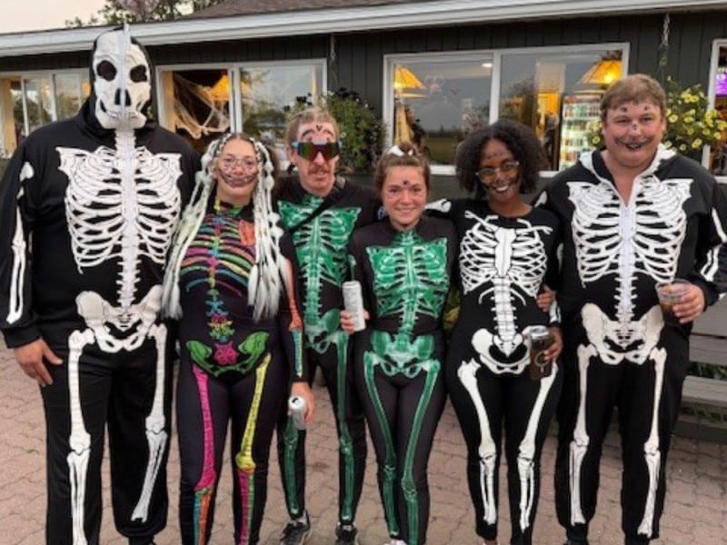 Teams in costume for the Dawson Creek Kinsmen Club’s 2025 nighttime Glowball golf tournament. (Dave Meise)