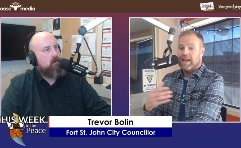 Two people recording a podcast