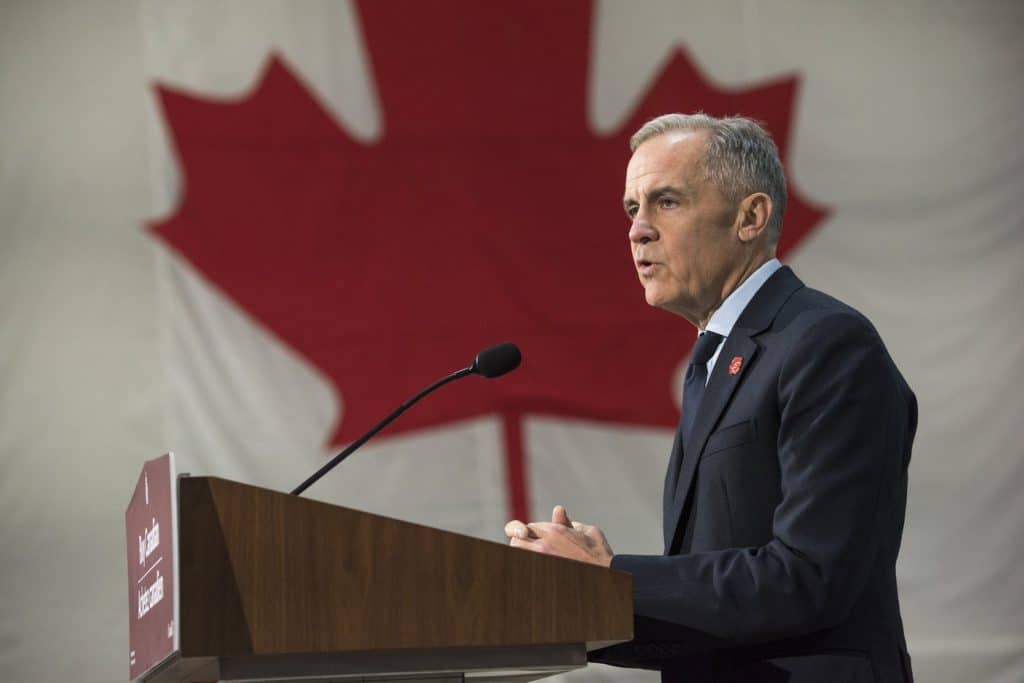 Prime Minister Mark Carney makes an announcement at the manufacturing facility of Maple Leaf Homes in Fredericton on Monday, November 10th, 2025. (THE CANADIAN PRESS/Stephen MacGillivray)