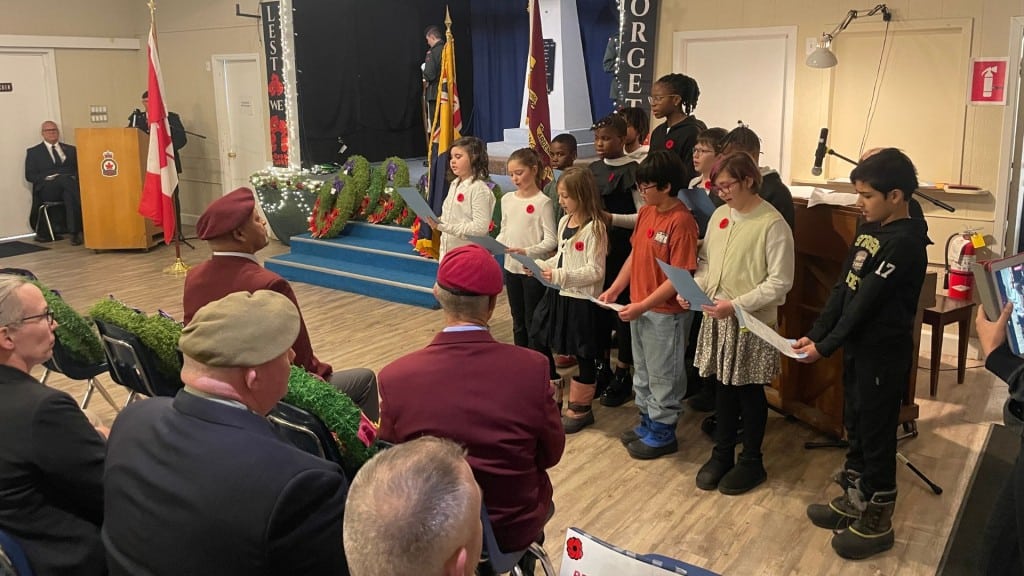 Students from Margaret 'Ma' Murray Community School performing for Remembrance Day 2025. (Franki Berry, Energeticcity.ca)