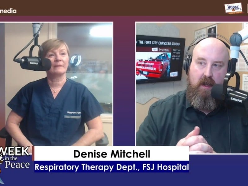 Two people recording a podcast