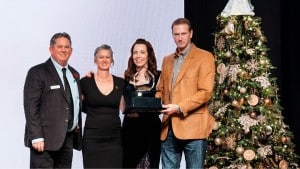 Left to right: Foundation board member Jim Reeder, executive director Kelly Amboe and Jenelle and Mat Loewen of Mustang Rentals with the Corporate Acts of Responsibility and Excellence (CARE) Award at the Be an Angel Gala in 2025.(Becky Newsham/Rundown Ranchography)