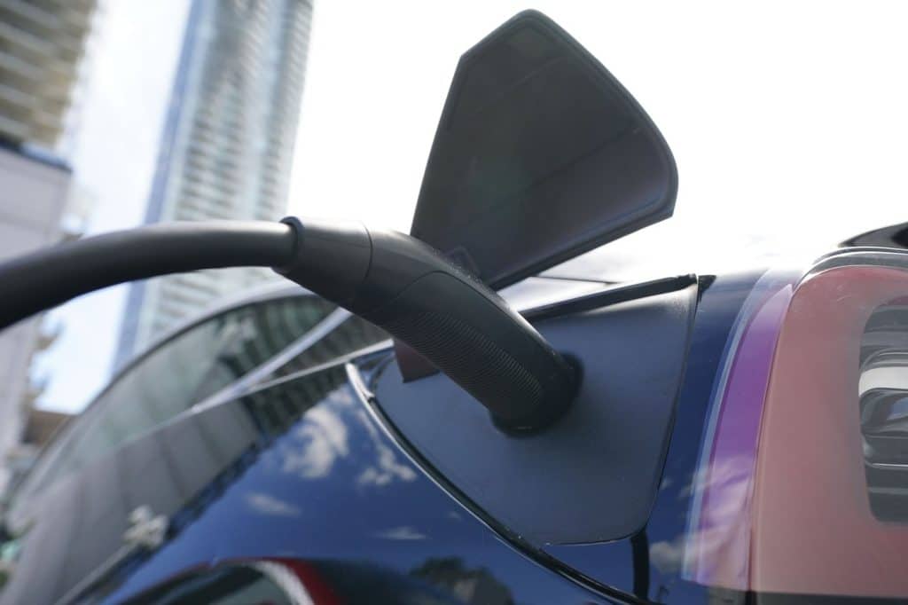 An electric vehicle is charged in Ottawa on Wednesday, July 13th, 2022. (THE CANADIAN PRESS/Sean Kilpatrick)