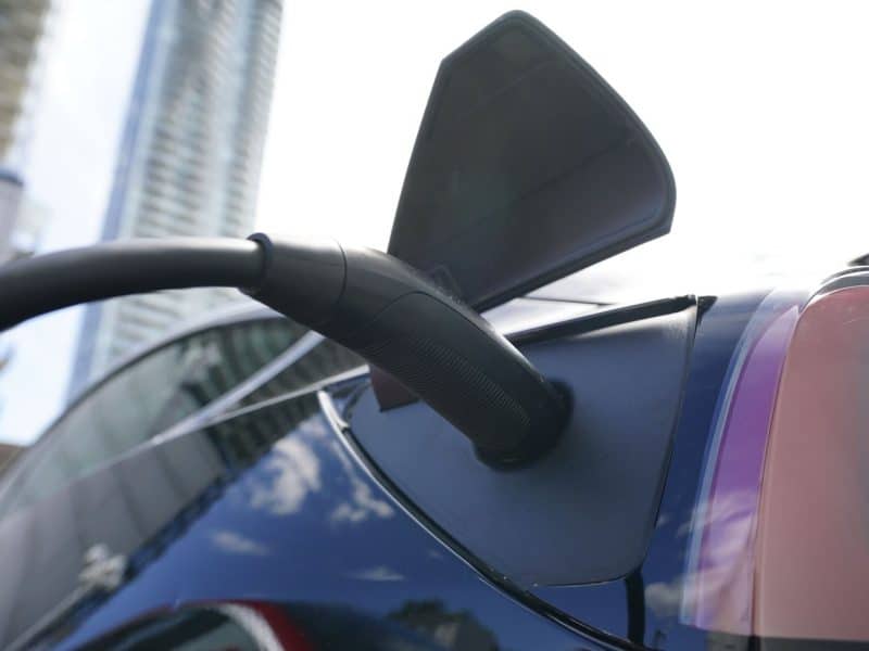 An electric vehicle is charged in Ottawa on Wednesday, July 13th, 2022. (THE CANADIAN PRESS/Sean Kilpatrick)