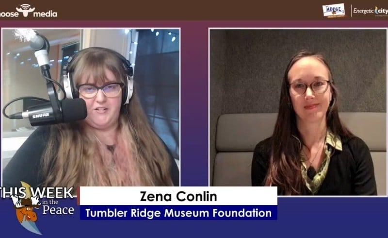 Two people smiling at the camera