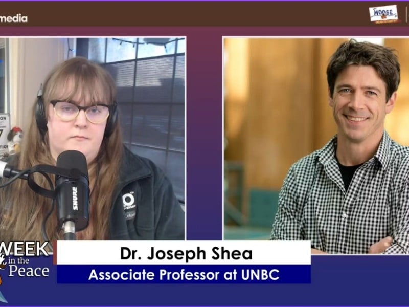 Two people recording a podcast