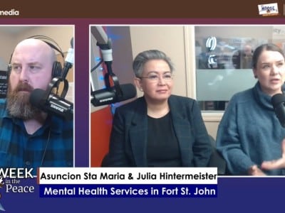 Three people recording a podcast