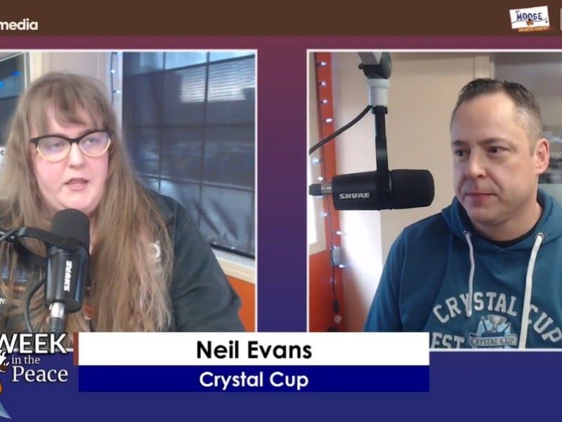 Two people recording a podcast