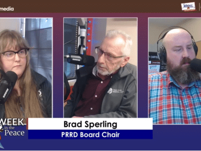 Three people recording a podcast