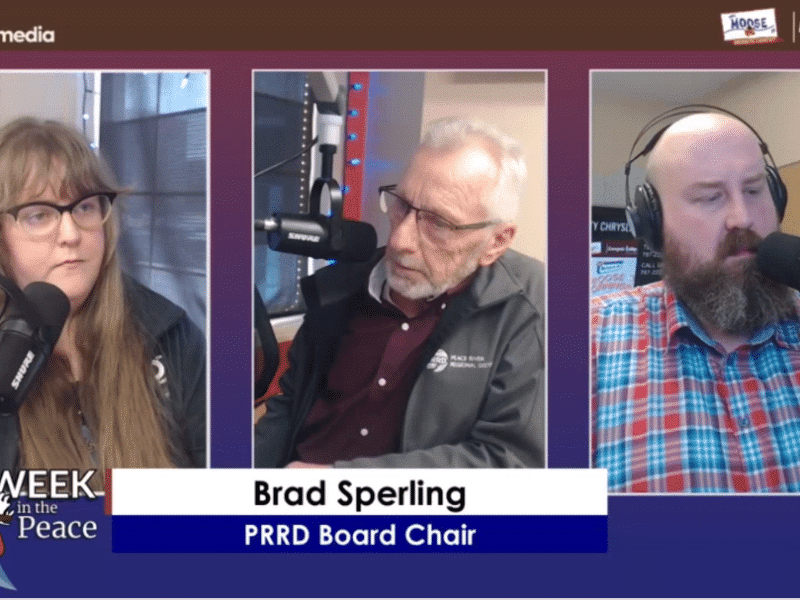 Three people recording a podcast