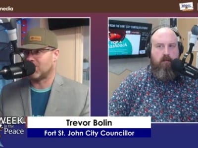 Two people recording a podcast