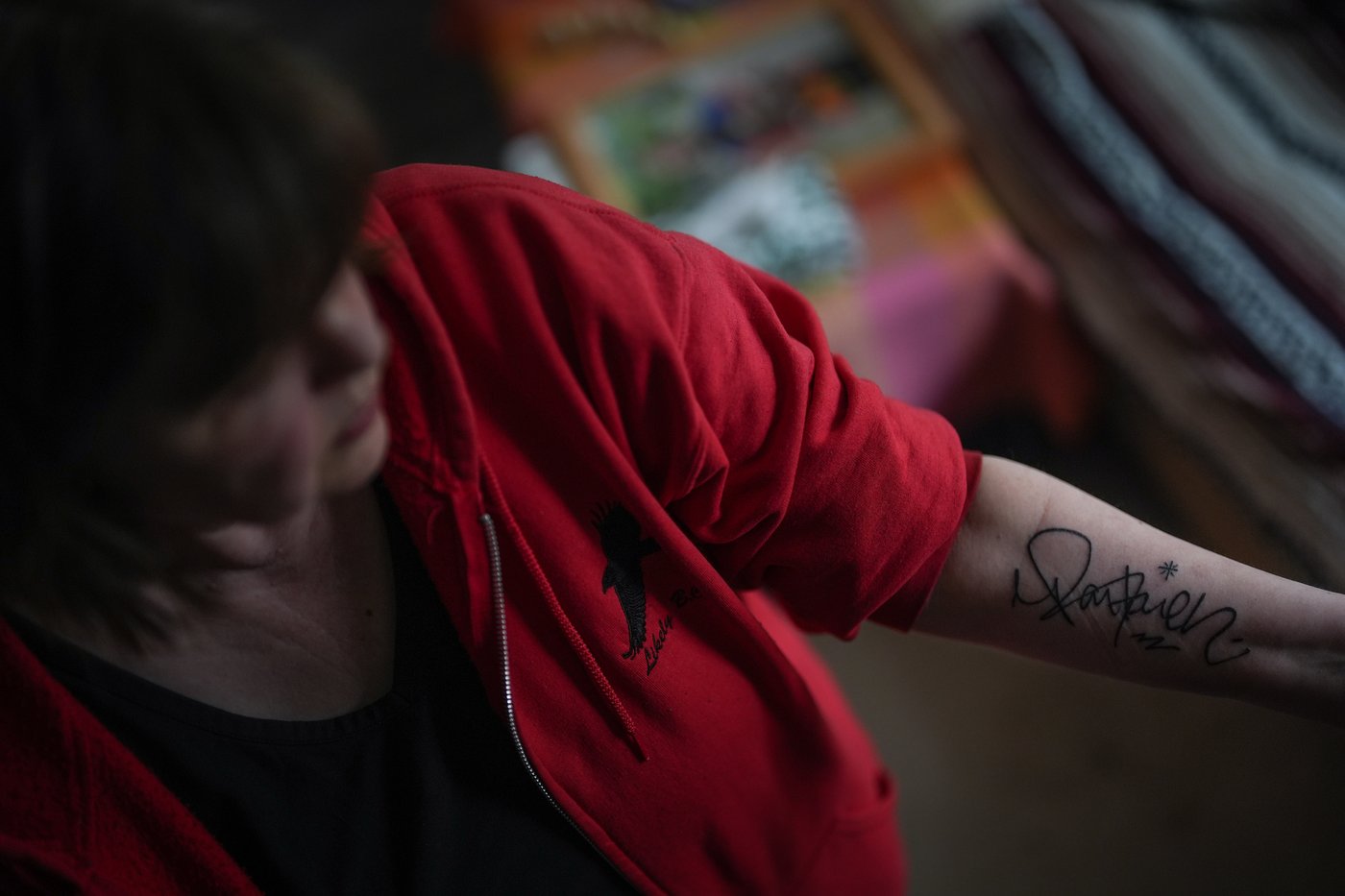Maria Rantanen shows her tattoo of her late son Michael Rantanen's signature on her forearm, while posing for a photograph in Vancouver, on Wednesday, March 18, 2026. Her son died of a fentanyl overdose in 2022 at the age of 25. THE CANADIAN PRESS/Darryl Dyck