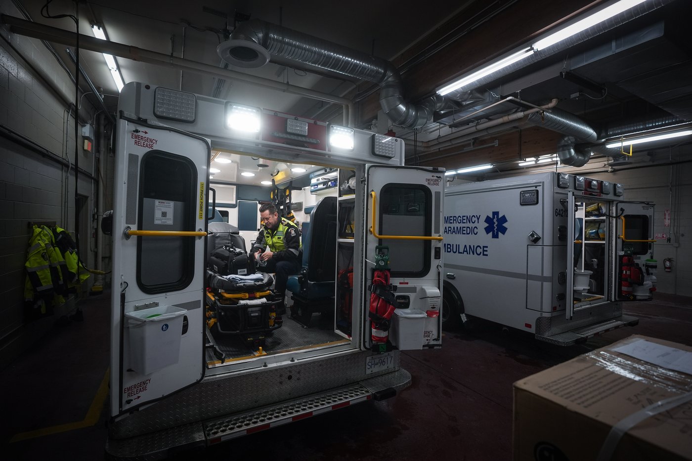 Paramedic supervisor Ian Tait checks equipment in an ambulance, in Chilliwack, B.C., on Wednesday, March 11, 2026. THE CANADIAN PRESS/Darryl Dyck