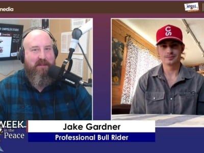 Two people smiling at the camera