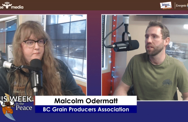 Two people recording a podcast