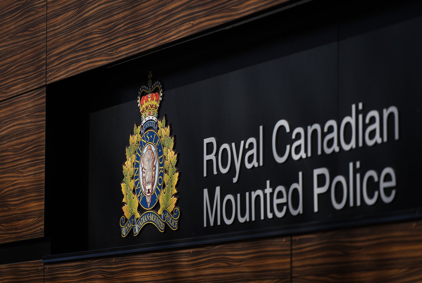 The RCMP logo is seen outside the force's 'E' division headquarters in Surrey, B.C., on March 16, 2023. THE CANADIAN PRESS/Darryl Dyck