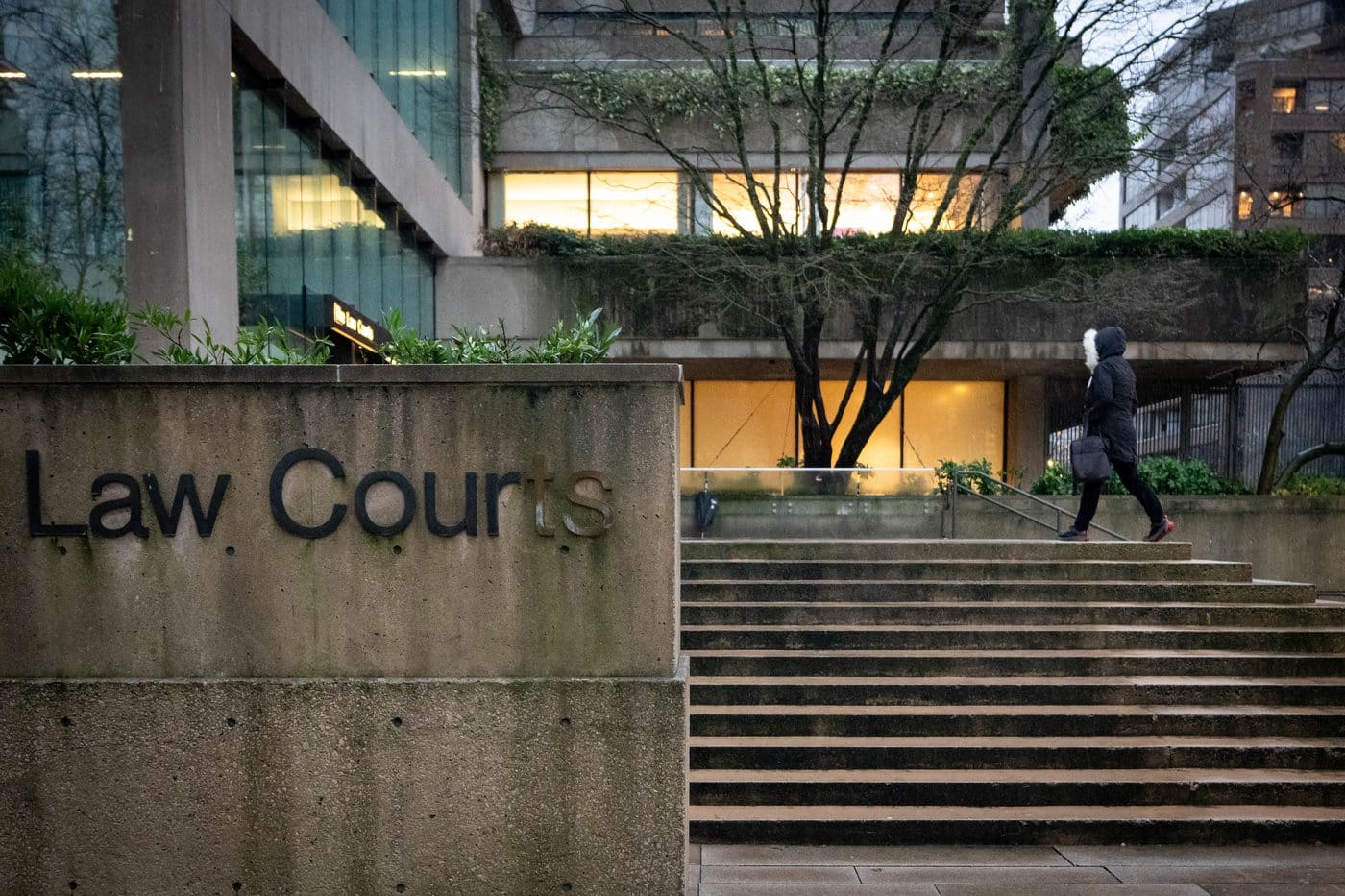 A person walks up the stairs of the Law Courts building, which is home to B.C. Supreme Court and the Court of Appeal, is seen in Vancouver, on Monday, Jan. 12, 2026. THE CANADIAN PRESS/Ethan Cairns