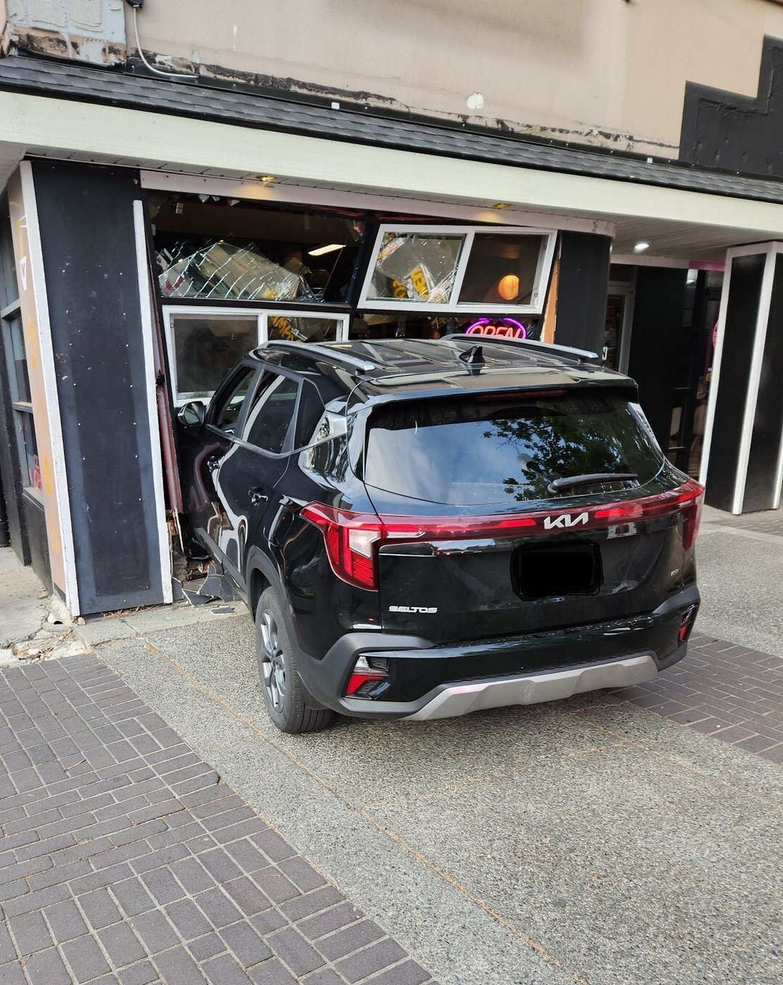 A vehicle is shown after crashing into a sushi restaurant in Nanaimo, B.C. in this Monday, May 18, 2026 handout photo. A man suspected of impaired driving has been detained in B.C. after the car he was driving crashed into a sushi restaurant on Vancouver Island. THE CANADIAN PRESS/Handout — Nanaimo RCMP (Mandatory Credit)