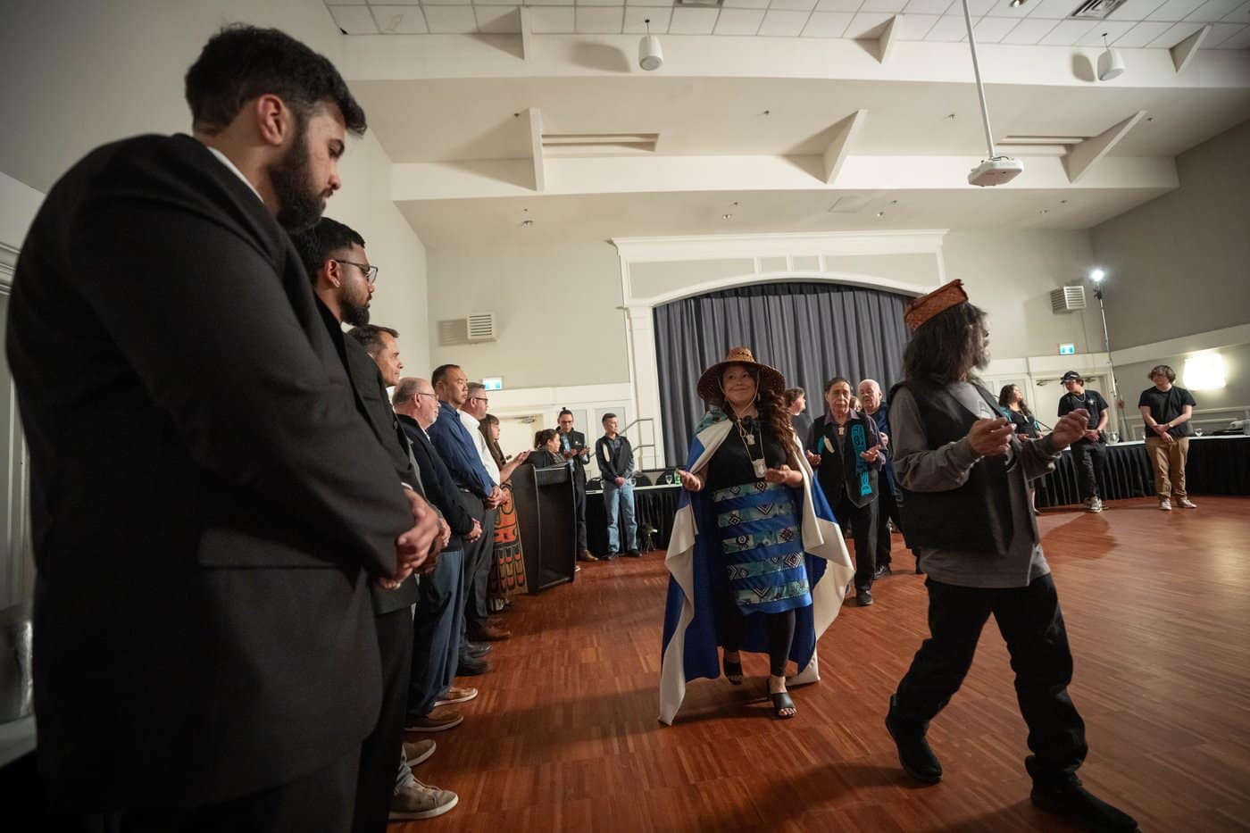 Dawn Wilson gestures towards representatives from Canadian Tire and Blackbird Security during a Heiltsuk Nation washing ceremony in Vancouver, on Tuesday, May 19, 2026. THE CANADIAN PRESS/Ethan Cairns