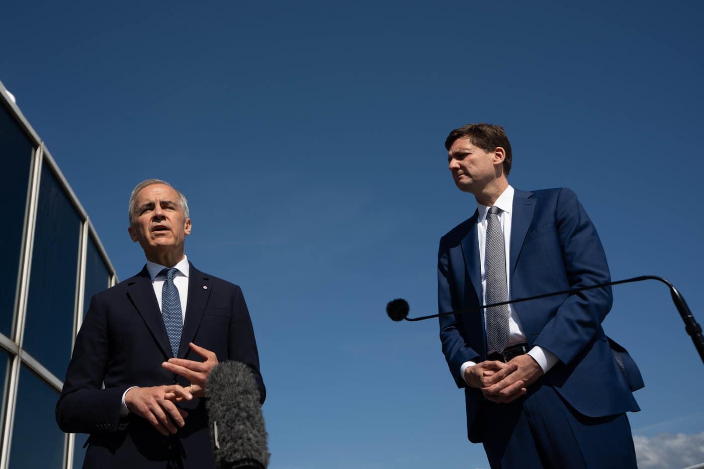Prime Minister Mark Carney speaks beside B.C. Premier David Eby in Vancouver, on Wednesday, May 20, 2026. THE CANADIAN PRESS/Ethan Cairns