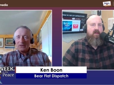 Two people recording a podcast