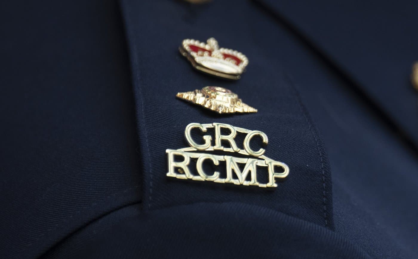An RCMP logo is seen on the shoulder of a superintendent during a news conference in St. John's, N.L., on Saturday, June 24, 2023. THE CANADIAN PRESS/Adrian Wyld