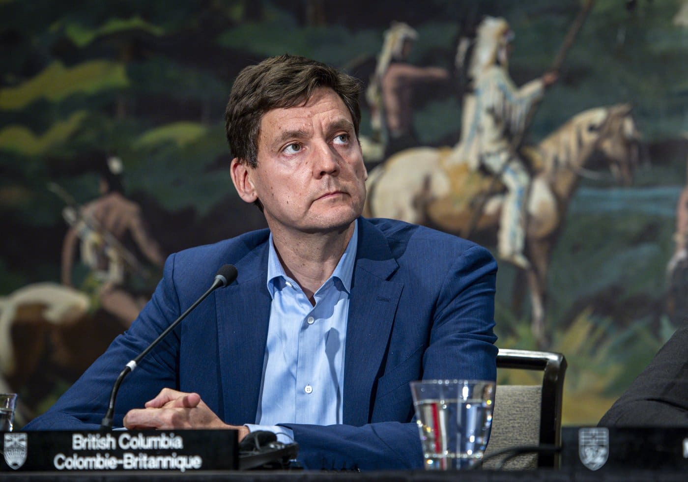 B.C. Premier David Eby listens to a speaker at a closing news conference of a meeting of western premiers in Kananaskis, Alta., Tuesday, May 26, 2026. THE CANADIAN PRESS/Jeff McIntosh