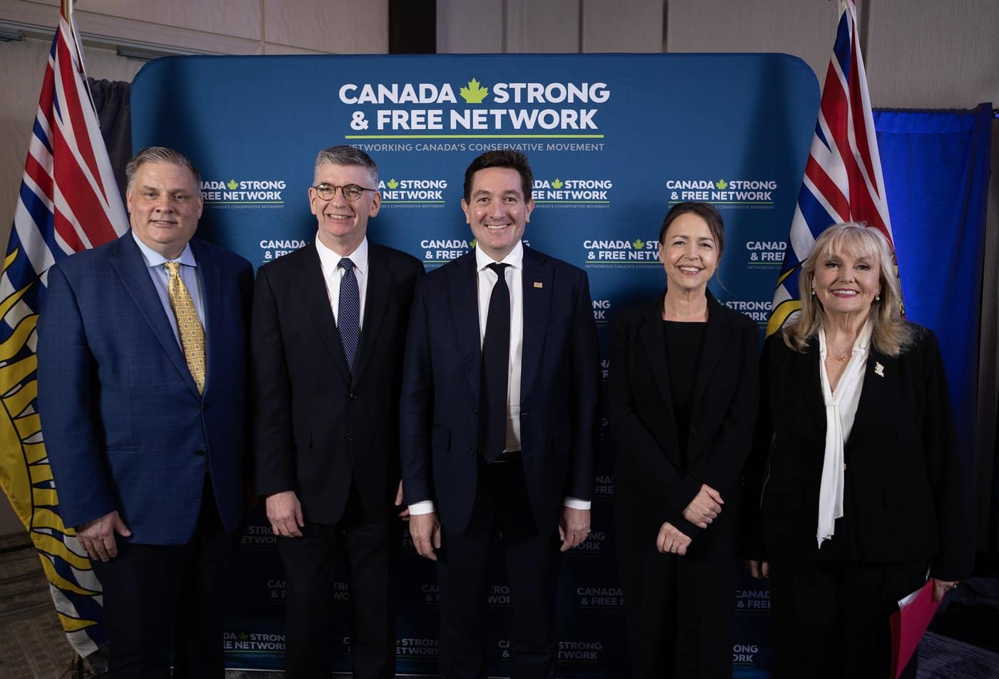 B.C. Conservative leadership candidates from left to right, Peter Milobar, Iain Black, Yuri Fulmer, Caroline Elliott and Kerry-Lynne Findlay pose for a photograph following a debate at the Canada Strong and Free Network conference in Vancouver on Friday, April 24, 2026. THE CANADIAN PRESS/Chad Hipolito
