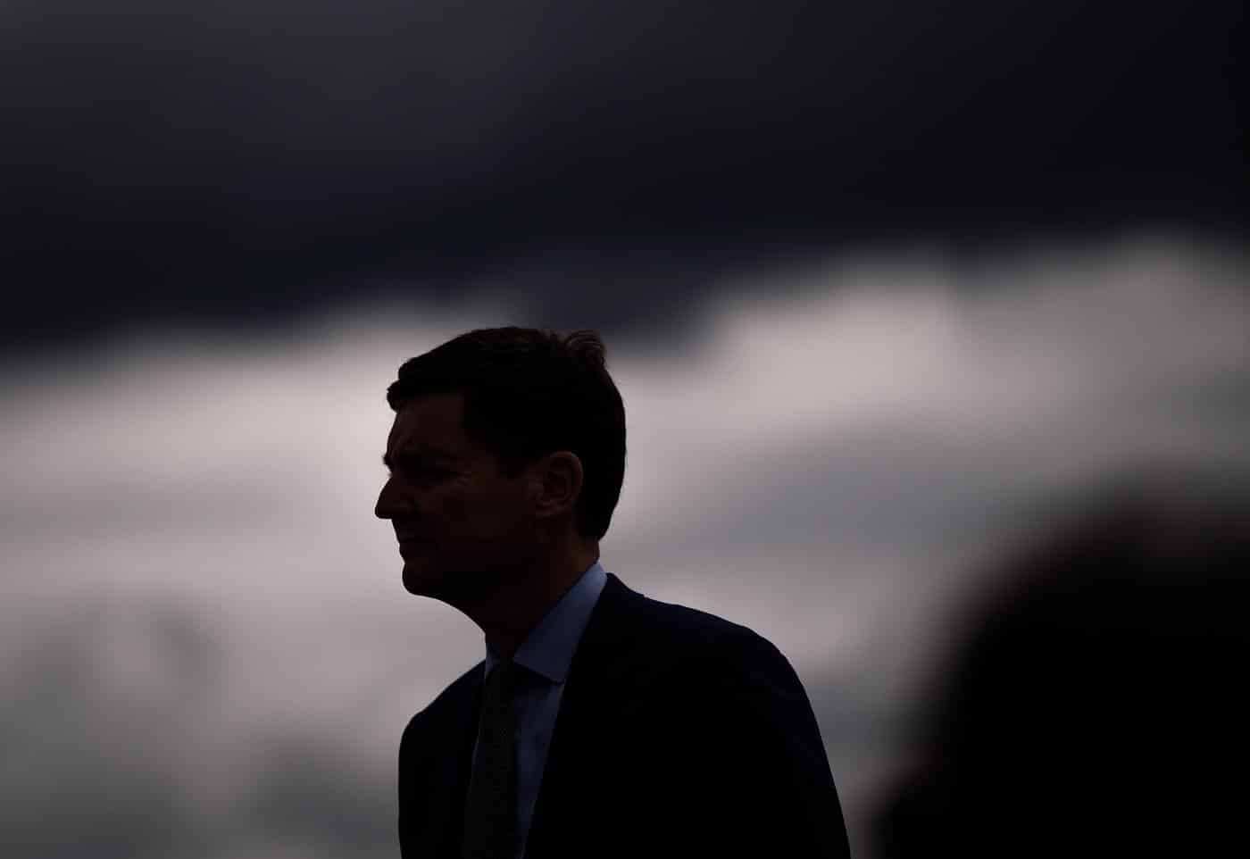 B.C. Premier David Eby is silhouetted during an announcement about mining in the province, in Vancouver, on Monday, May 26, 2025. THE CANADIAN PRESS/Darryl Dyck