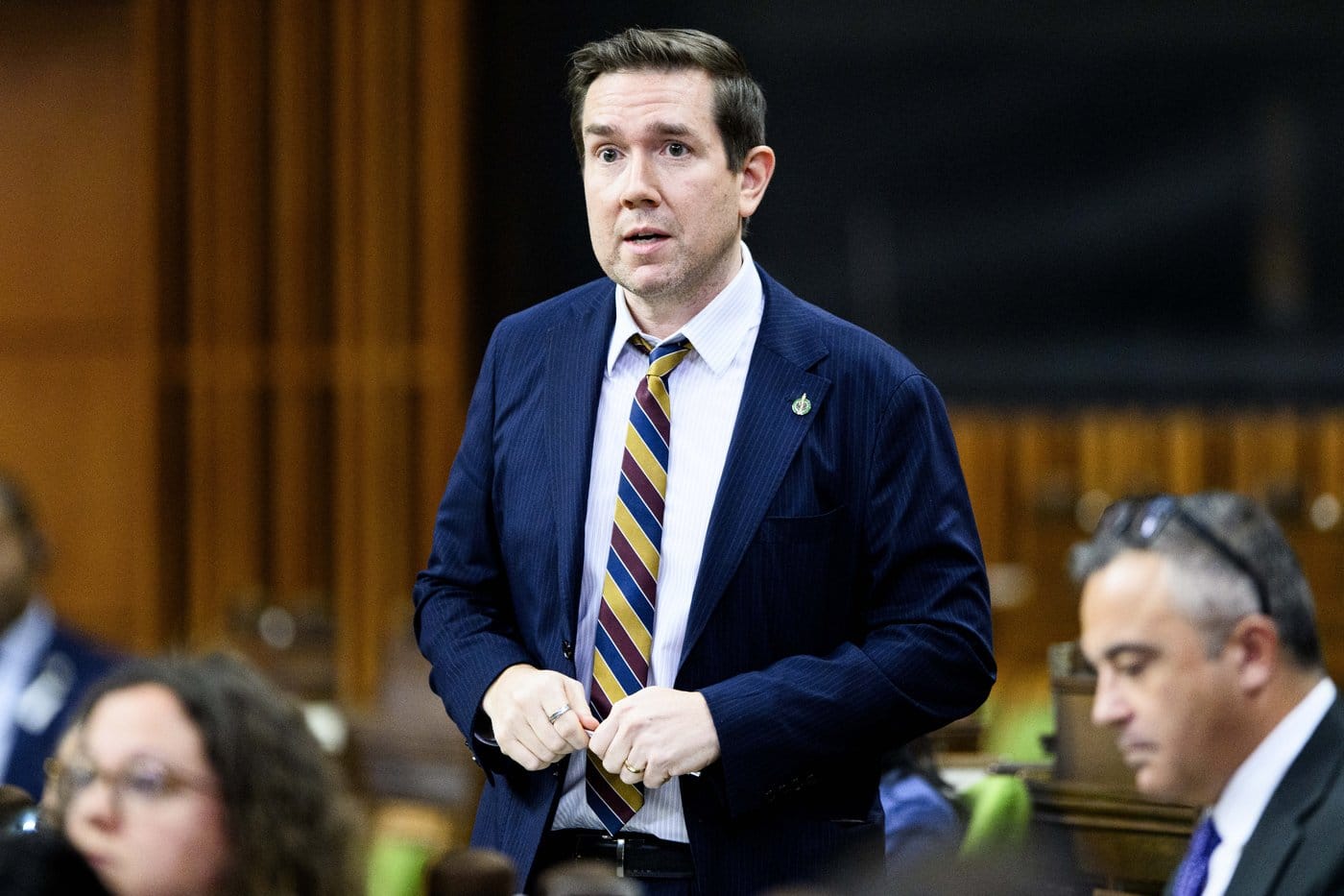 Liberal MP Corey Hogan rises during Question Period in the House of Commons on Parliament Hill in Ottawa on Friday, Dec. 5, 2025. THE CANADIAN PRESS/Spencer Colby