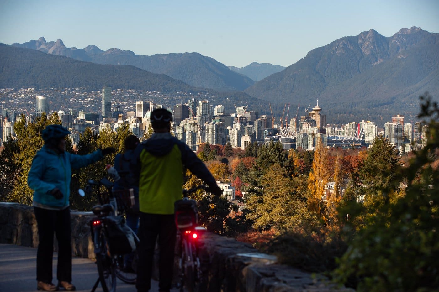 People take in the view of the downtown skyline, north shore mountains and fall foliage from Queen Elizabeth Park in Vancouver on Sunday, November 8, 2020. THE CANADIAN PRESS/Darryl Dyck