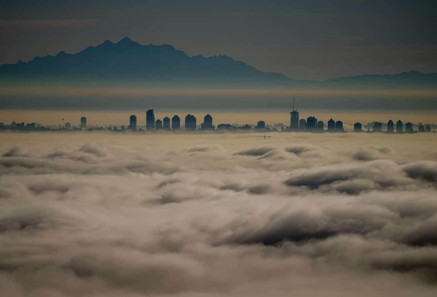 Condo towers in Burnaby, B.C., line the skyline as fog blankets Metro Vancouver, on Sunday, Nov. 26, 2023. THE CANADIAN PRESS/Darryl Dyck