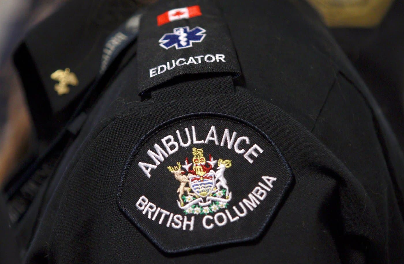 A B.C. Ambulance Service paramedic wears a uniform while at the central reporting station in Victoria, B.C., on Thursday, Nov. 9, 2023. THE CANADIAN PRESS/Chad Hipolito