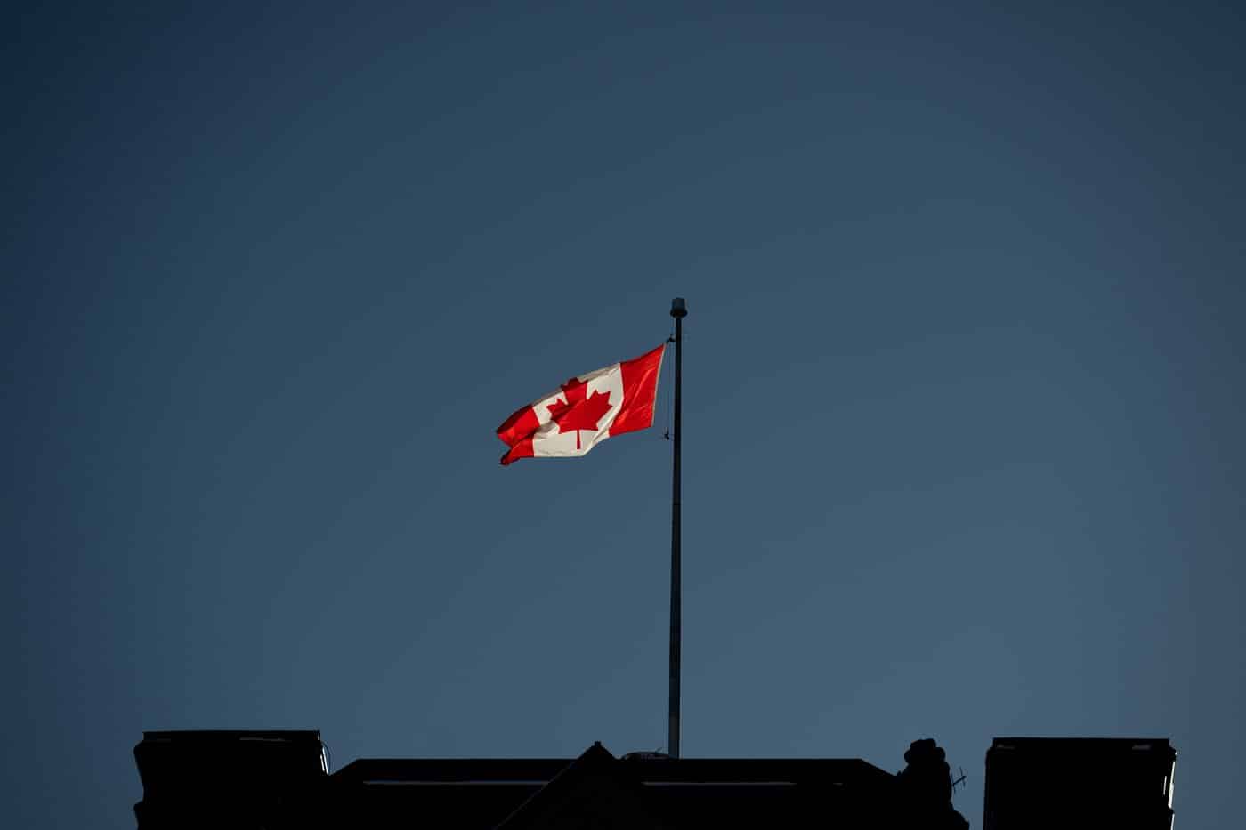 The flag flies over the Prime Minister's Office near Parliament Hill in Ottawa on Wednesday, Jan. 15, 2025. THE CANADIAN PRESS/Spencer Colby