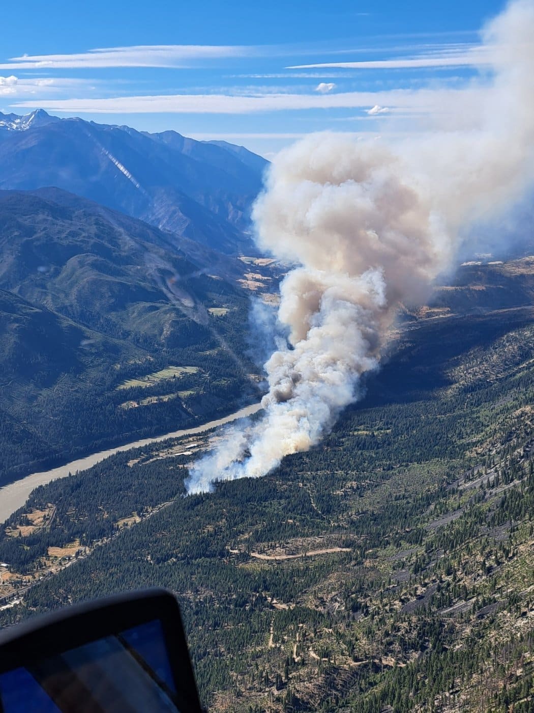 The Saw Creek wildfire is seen in this handout photo, south of Lytton, B.C., on Friday, June 19, 2026. THE CANADIAN PRESS/Handout — BC Wildfire Service (Mandatory Credit)