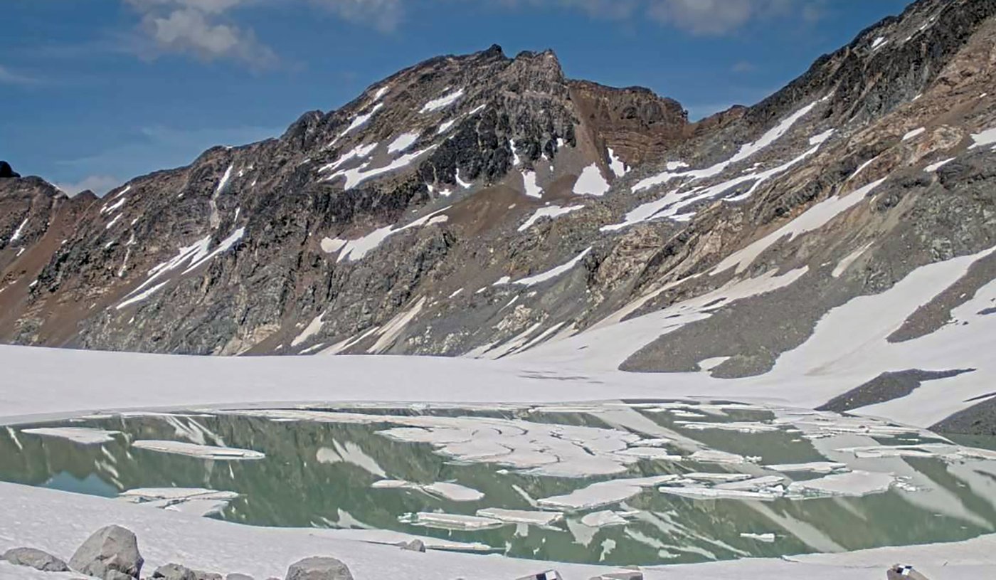 Place Glacier ice marginal lake on pictured on Sunday, June 28, 2026. Squamish-Lillooet Regional District says the Place Glacier lake outburst is ongoing and hazardous debris flows are expected in Place Creek and downstream waterways. An evacuation order is in effect for more than 20 properties in the Gates Lake and Poole Creek areas, about 150 kilometres north of Vancouver. THE CANADIAN PRESS/Handout - Squamish-Lillooet Regional District (Mandatory Credit)