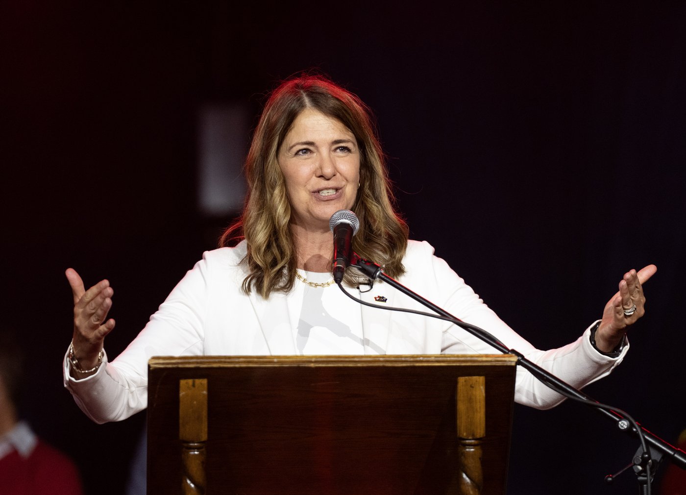 Alberta Premier Danielle Smith addresses a crowd before a music concert at Spruce Meadows on Canada Day in Calgary on Wednesday, July 1, 2026. THE CANADIAN PRESS/Todd Korol