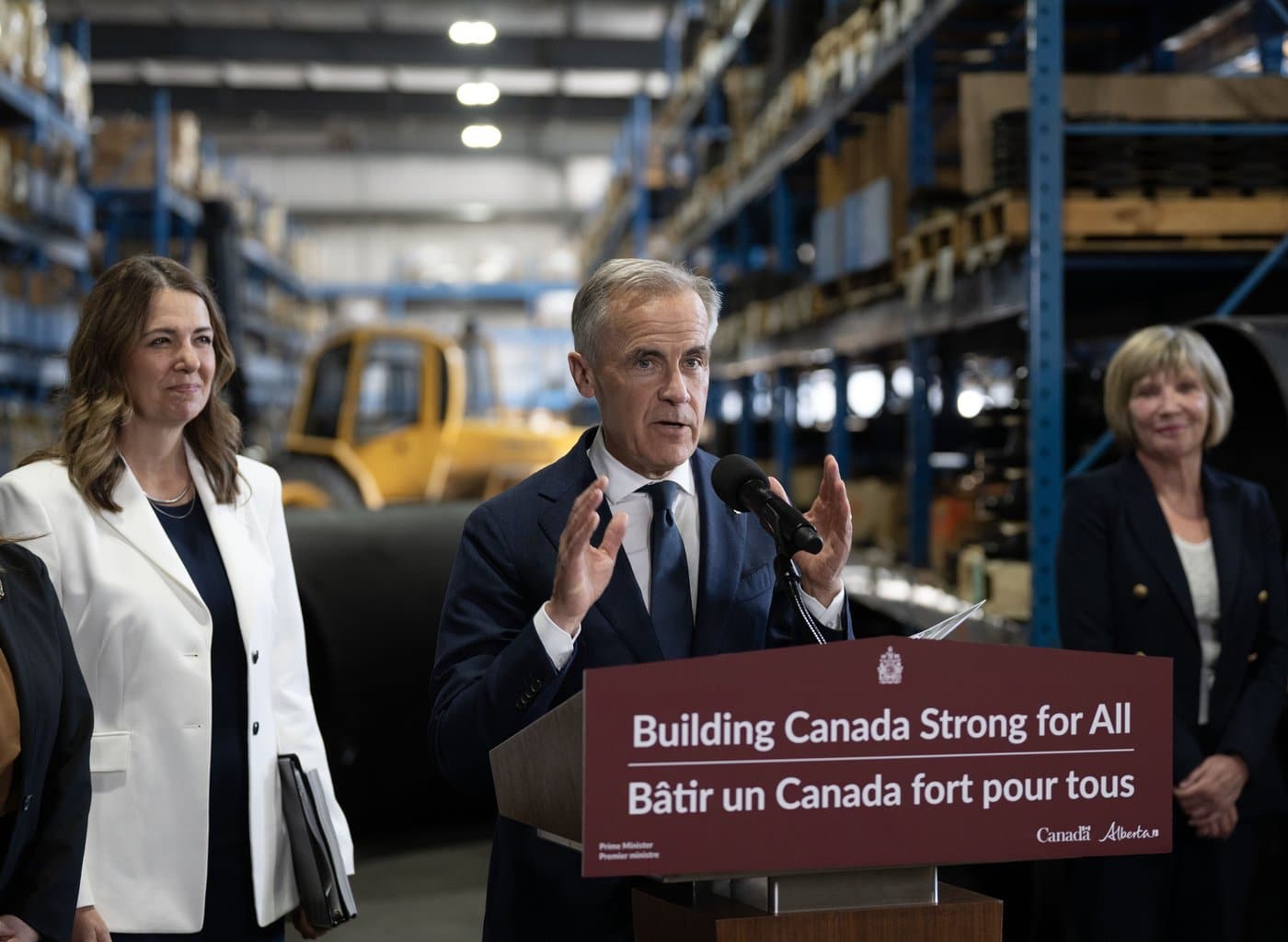 Prime Minister Mark Carney and Alberta Premier Danielle Smith announce a proposed pipeline from Alberta to the B.C. coast in Calgary on Thursday, July 02, 2026. THE CANADIAN PRESS/Todd Korol